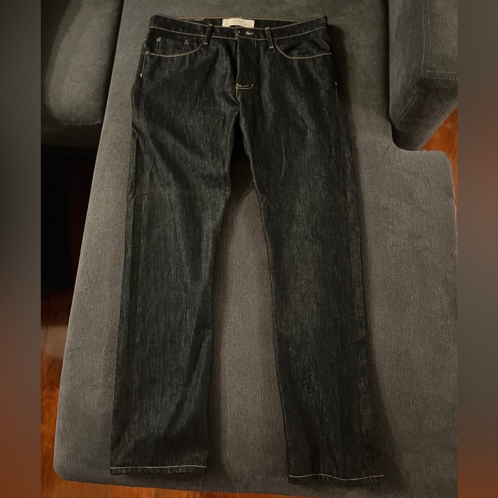 THVM tapered fit Raw denim jeans
